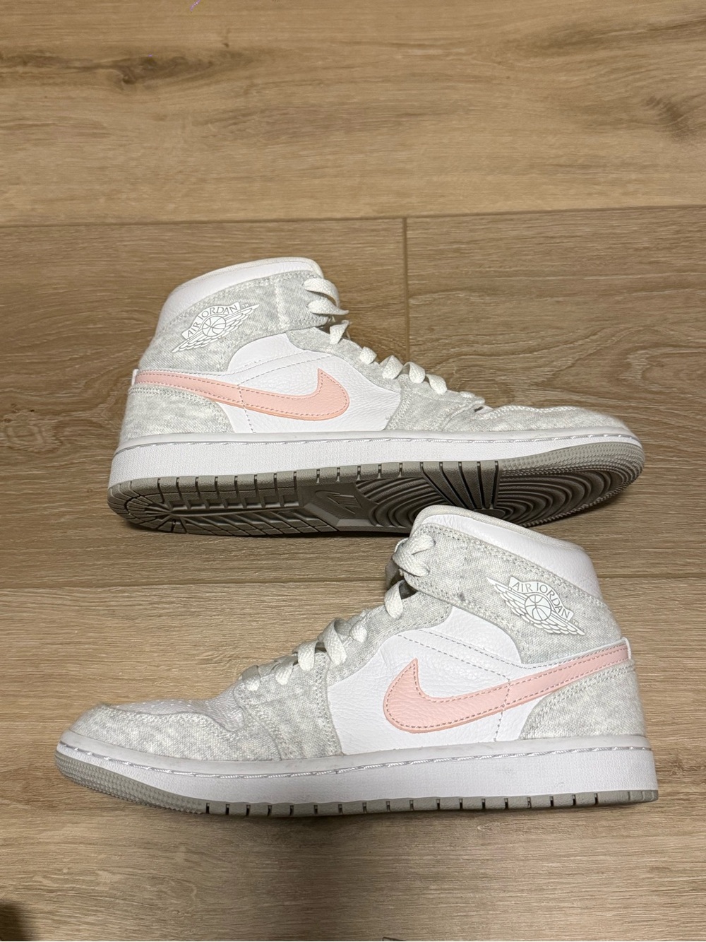 Jordan Women’s High-Top Sneakers in White & Pale Pink